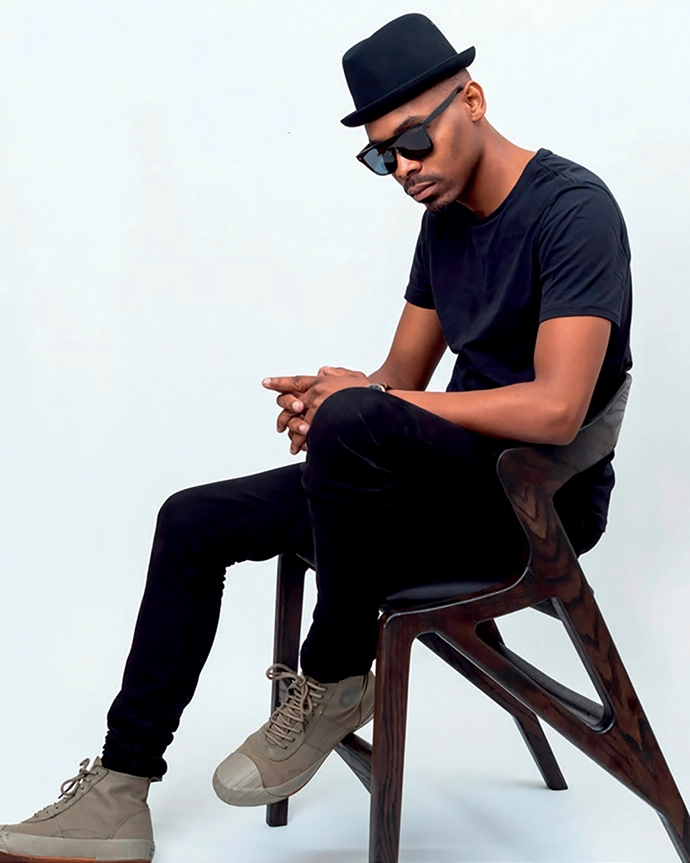 Khwebula Arts founder Sipho Khwebula Twala on the K1 dining chair.