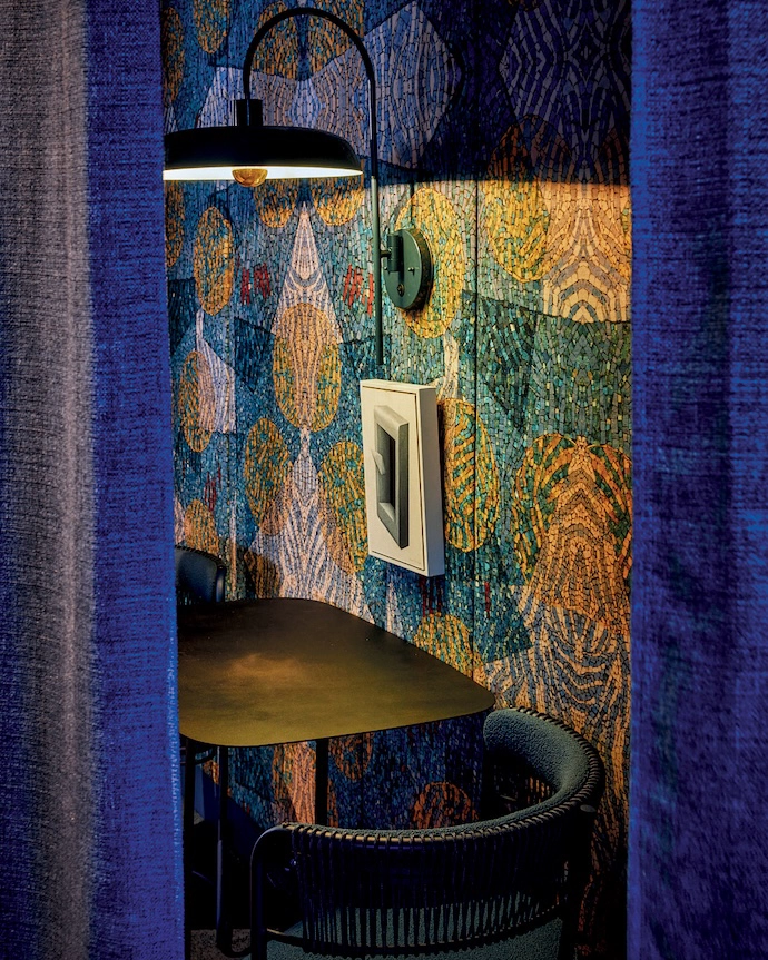 Wall light by Arrange Studio, chairs by TheUrbanative.