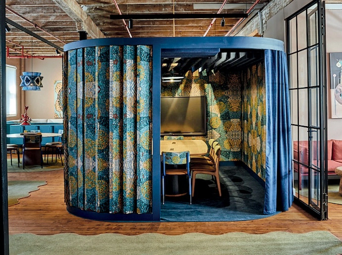 Printed fabric featuring artwork by Jo O’Connor (created in mosaic, scanned and printed), table by Kino.