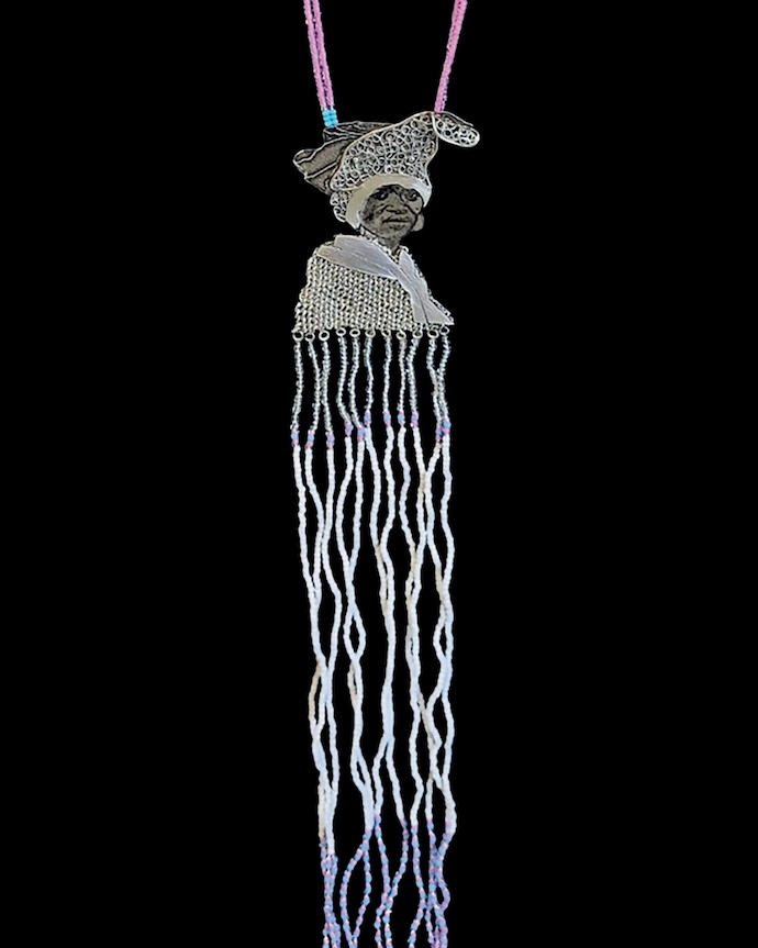 Dr Khanya Mthethwa's Xhosa Woman necklace (2024) – filigree, woven fine silver and glass beads.