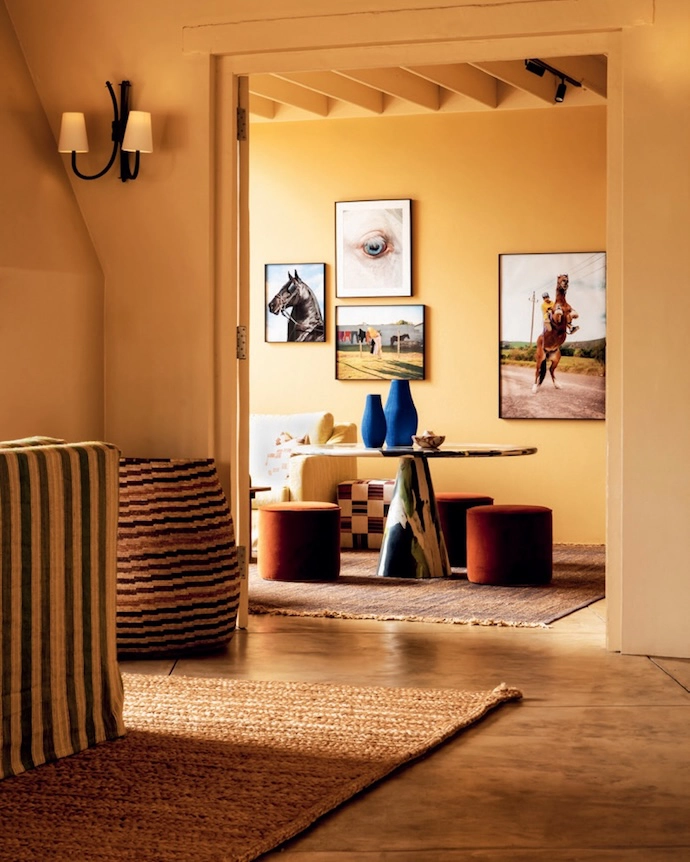 A palette of natural tones and organic textures runs throughout the estate buildings and accommodation, while painted walls and joinery, along with new stucco finishes on the fireplaces, reinforce a cohesive, timeless aesthetic.
