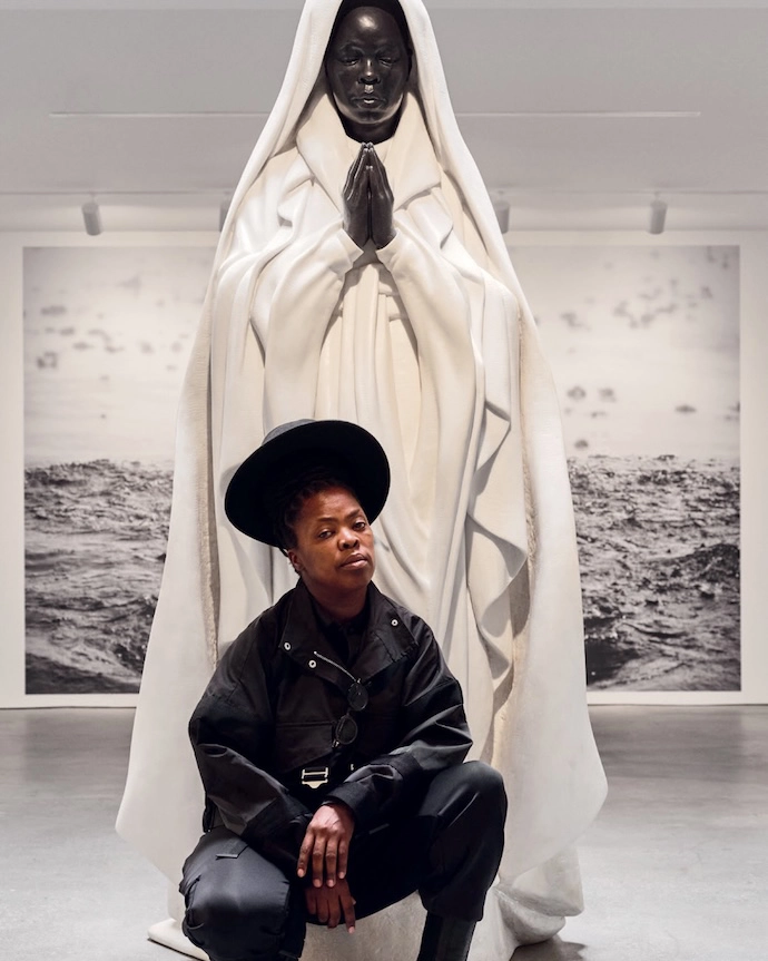 Zanele Muholi (Southern Guild) with their sculpture Umkhuseli (The Protector, 2023).