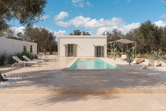 The small luxurious house opposite the main Villa overlooks the pool.