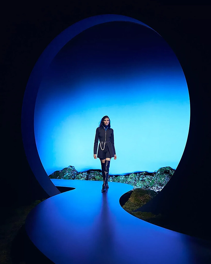 The shifting illumination caused fabrics and colors to transform as models moved through the space.