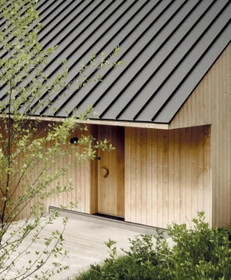 The cottage’s exterior cedar cladding was chosen for the way in which it will patinate over time.