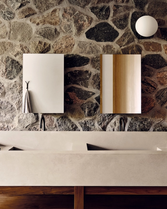 Colours and textures in the en suite echo those of the island.