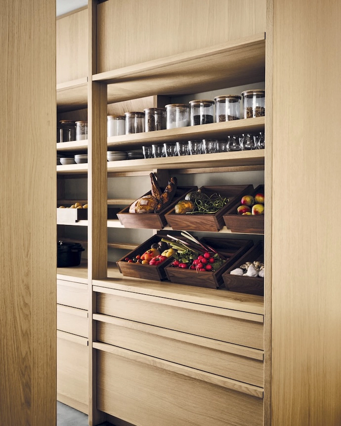 “We imagined the pantry as a functional market-style space with produce and food on full display,” says Thom. “Trays allow for easy transport of ingredients to and from the pantry.”
