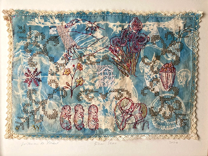 ‘Blue Skies’ by Willemien de Villiers is hand-stitched with cotton thread on found vintage domestic textile, cyanotype & stitch.