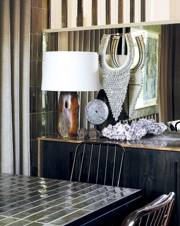 A mirrored wall turns a display space into a focal point.