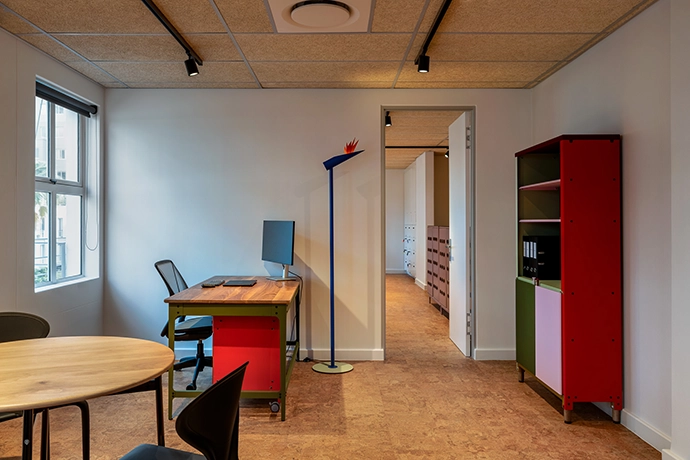 Dokter and Misses Motley Memo Desk, Strelitzia Standing Lamp and Motley Display Unit furnish and office space within the school.