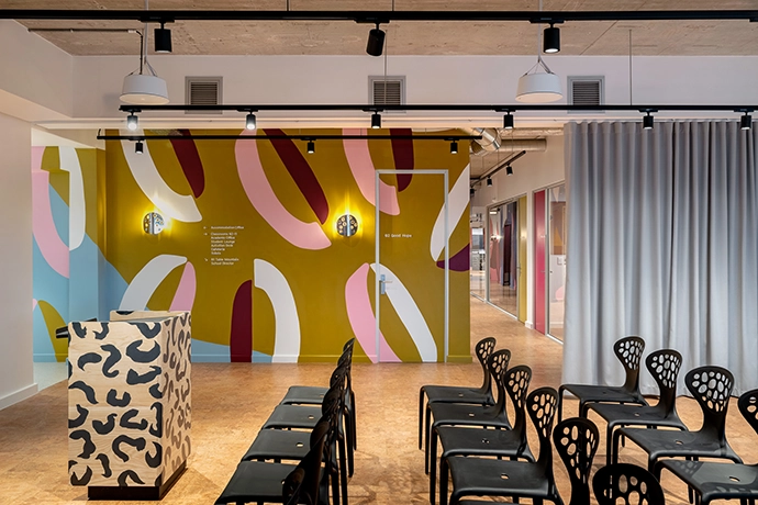 Dokter and Misses created a bespoke animal-print podium for the lecture room.