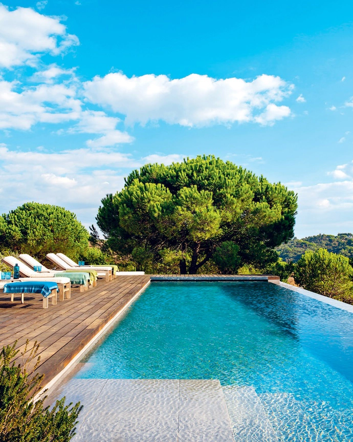 Set below the house, the Margres stoneware-clad pool overlooks an untamed landscape.