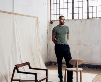 Tom Lead with his Studio chair (left ) and Koppie chair (right). The latter – a collab with Stripped Collective – was the winner of the Cape Town Furniture Week x VISI Design Prize.