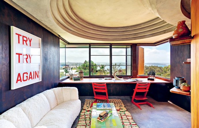 The home office includes vintage IKEA chairs and a coffee table by Piet Hein Eek, and has views of Manly Beach.