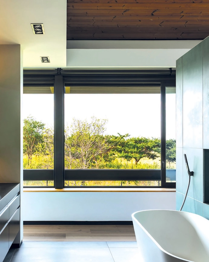 Views from the bathroom leave you feeling far from suburbia – as if you were out in the wilderness.