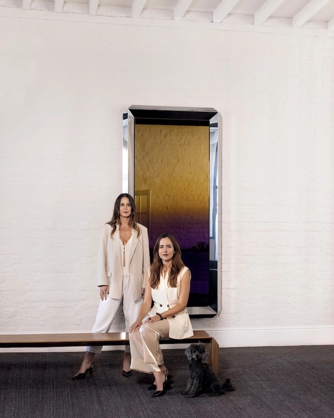 Wendy Dixon (left), Caitlin Warther and Ziggy. The mirror behind them - MŪ202 Spectrum mirror - was a collab with furniture designers Mūvek Studio.
