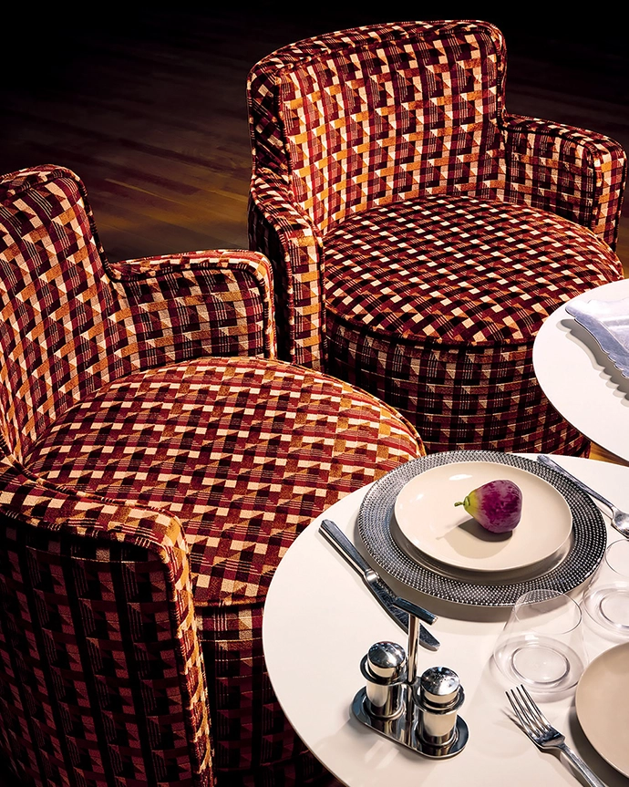 Armchairs upholstered in Piccadilly in Theatre.